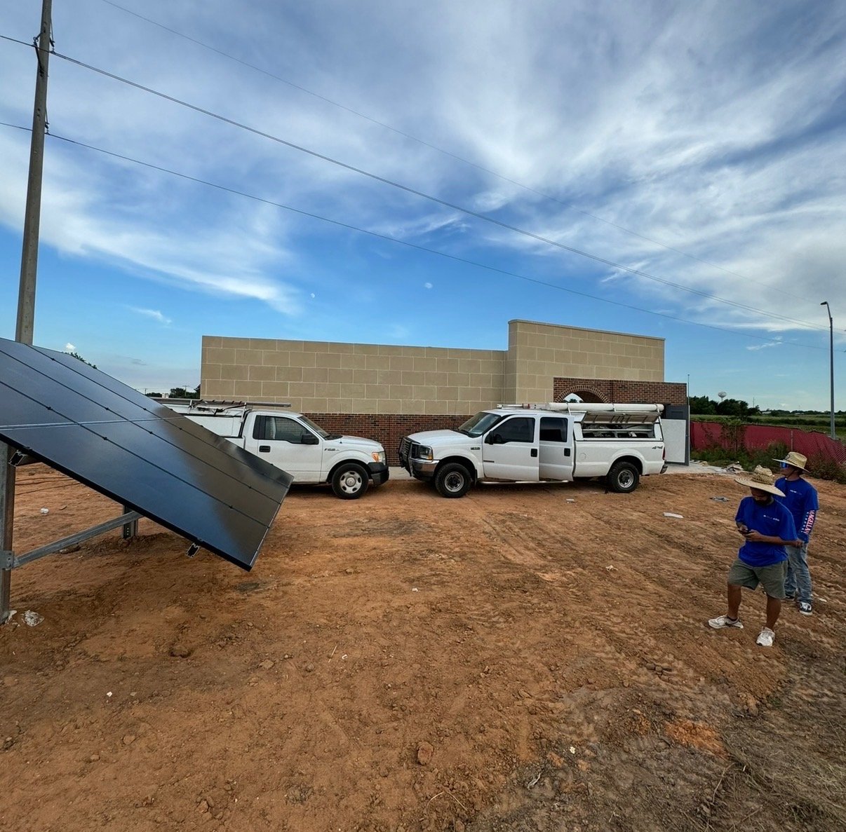 Ground-Mount Array — Crew and Trucks On Site by Eletech Electrical Solutions, Edinburg TX