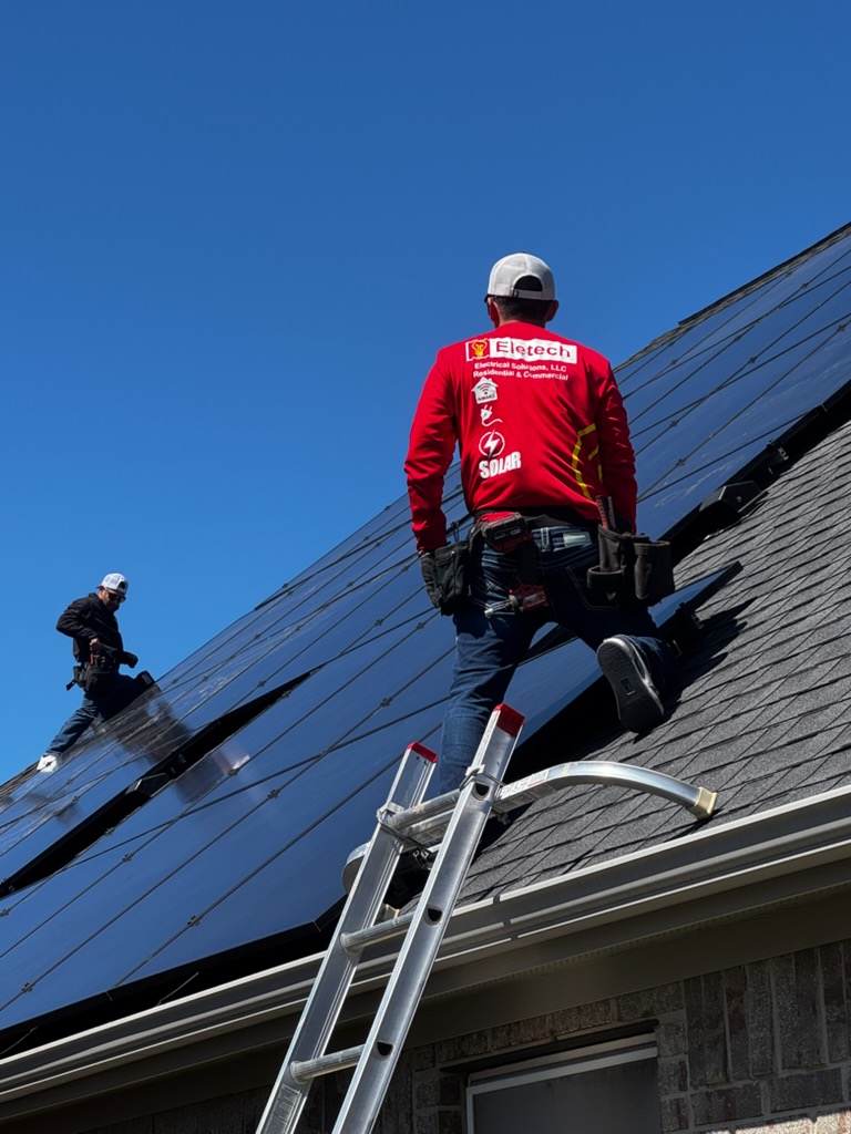 Eletech crew installing rooftop solar panels on a Valley home